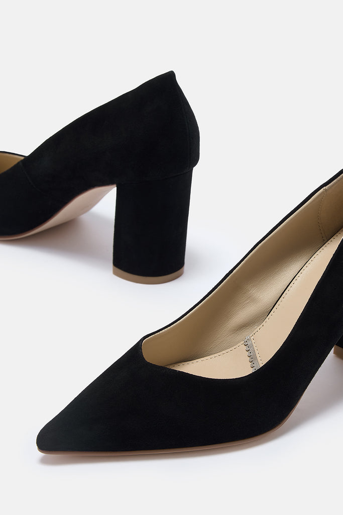 Black high-heeled shoes on a white background