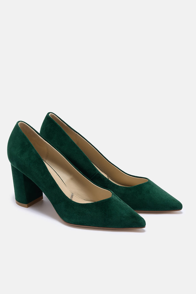 Pair of green high-heeled shoes on a white background