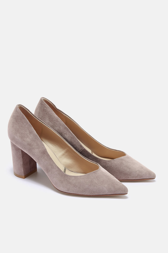Pair of taupe suede high-heeled shoes on a white background