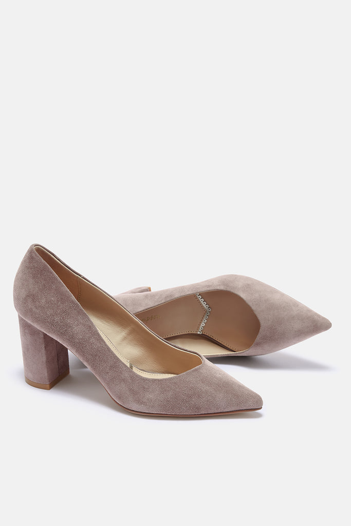 Pair of taupe suede high-heeled shoes on a white background