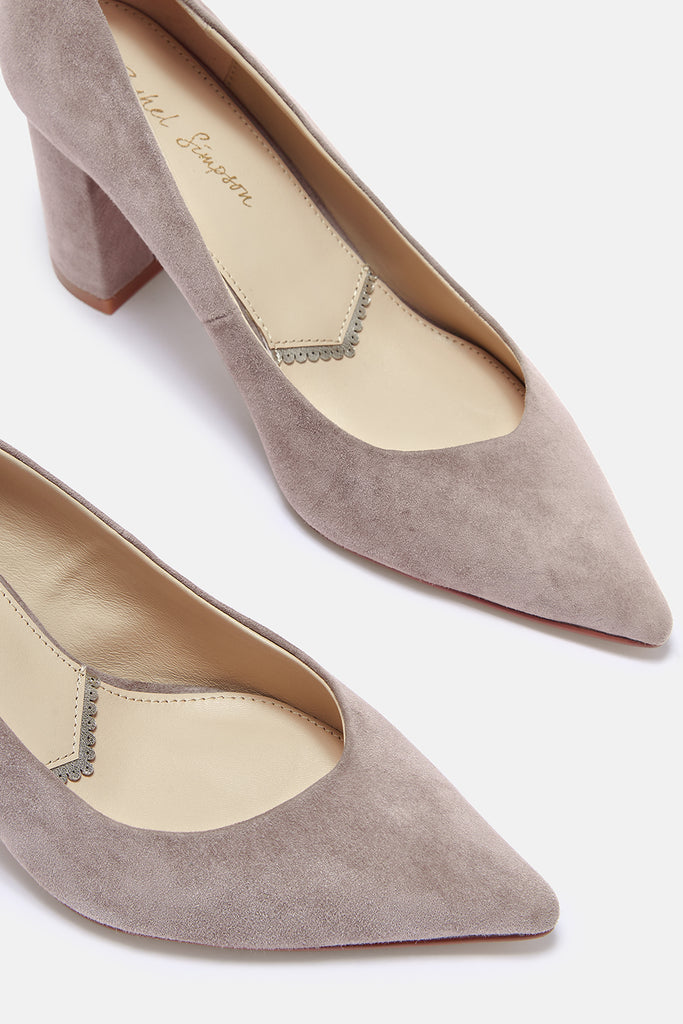 Pair of taupe high-heeled shoes on a white background