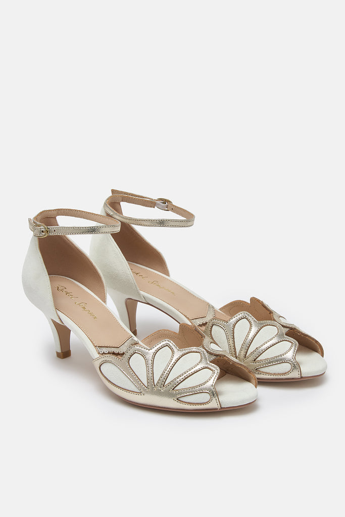 pair of ivory suede and gold art deco vintage style wedding shoes, with low heels and ankle strap