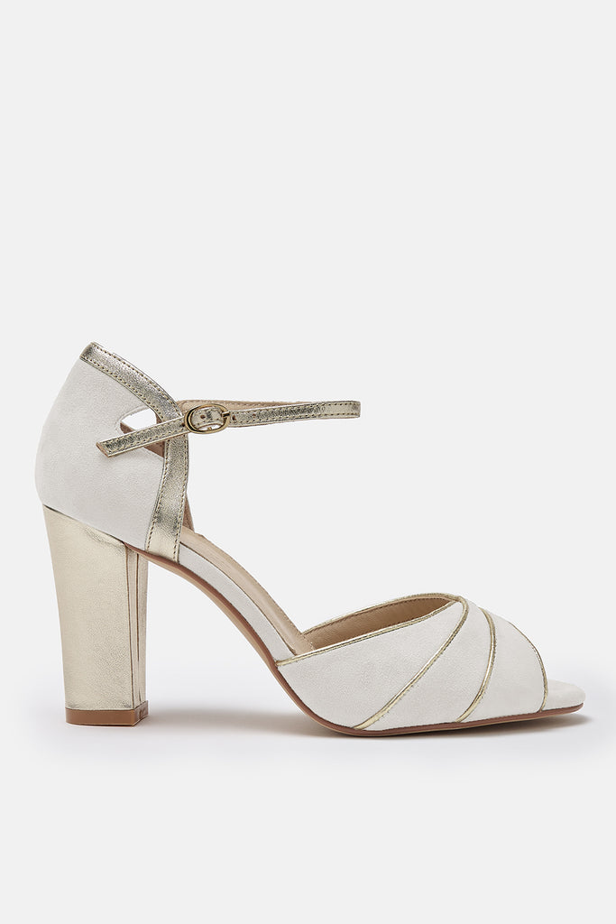 ivory suede wedding shoe with gold block heel and ankle strap- side view