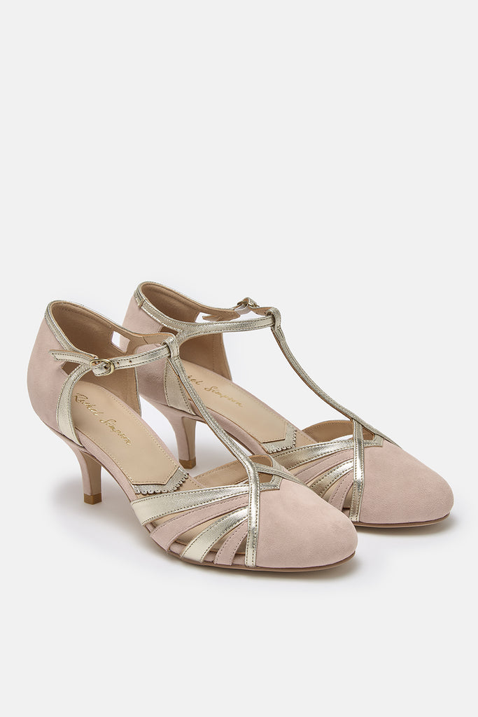 pair of blush pink suede and gold leather twenties vintage style t-bar occasion shoes, with low heels and ankle straps