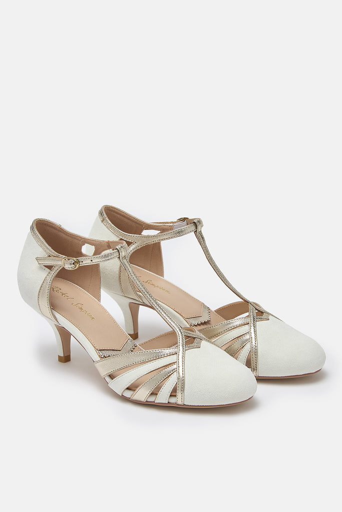 pair of ivory suede and gold leather twenties vintage style t-bar wedding shoes, with low heels and ankle straps